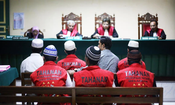 14 Muslim Rohingya on trial for brawl in Indonesia