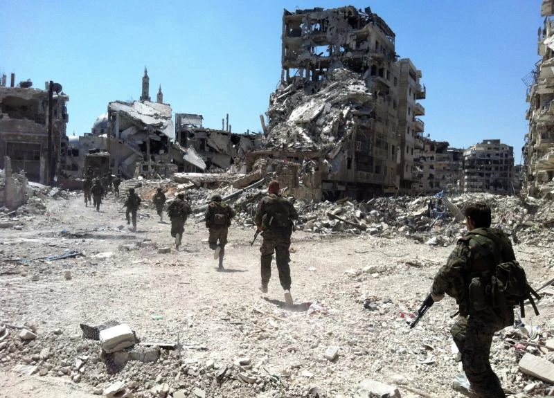 Syrian troops capture key Homs neighborhood