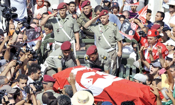 Car bomb, protest death stoke tension before Brahmi funeral