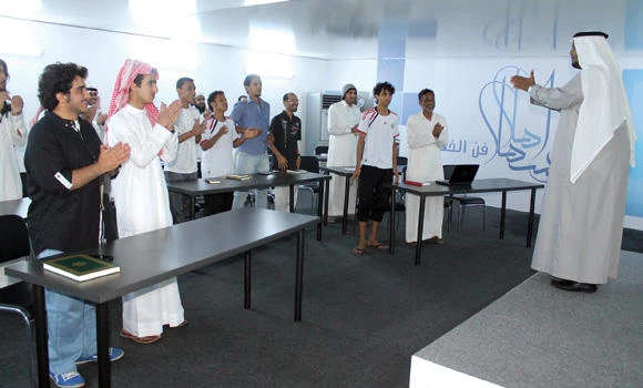 Arabic calligraphy enthusiasts learn the art in Baha festival