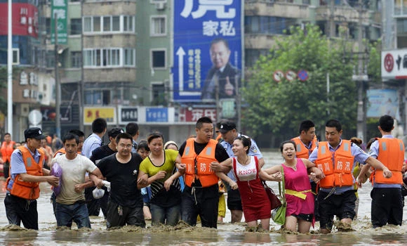 More than 200 dead or missing in China rain, landslides
