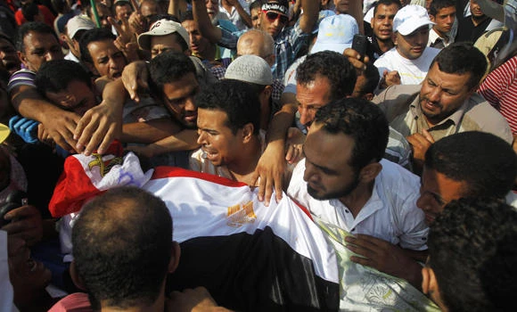 Cairo clash kills 54, divides nation deeper into crisis