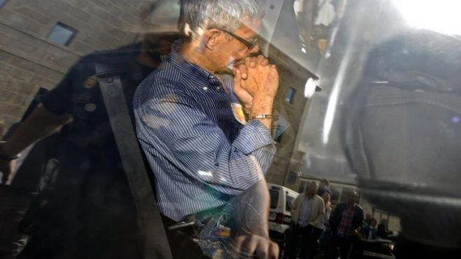 Spain hold memorial service for victims as train driver charged