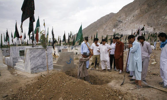 Death toll in Pakistan attacks climbs to 52