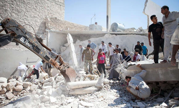 Assad militia executes 13 family members of rebel: NGO