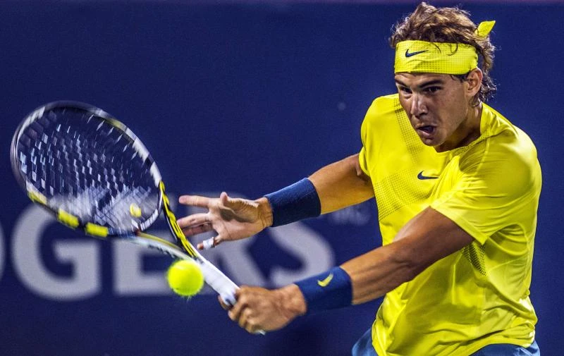 Nadal beats Djokovic to book Raonic clash for title