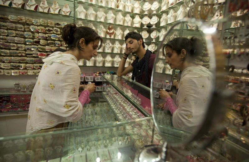 Gold up nearly 2% on ETF inflow, tight physical supply