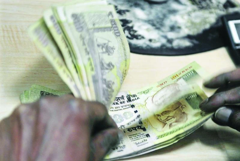 Indian rupee plunges to fresh record low