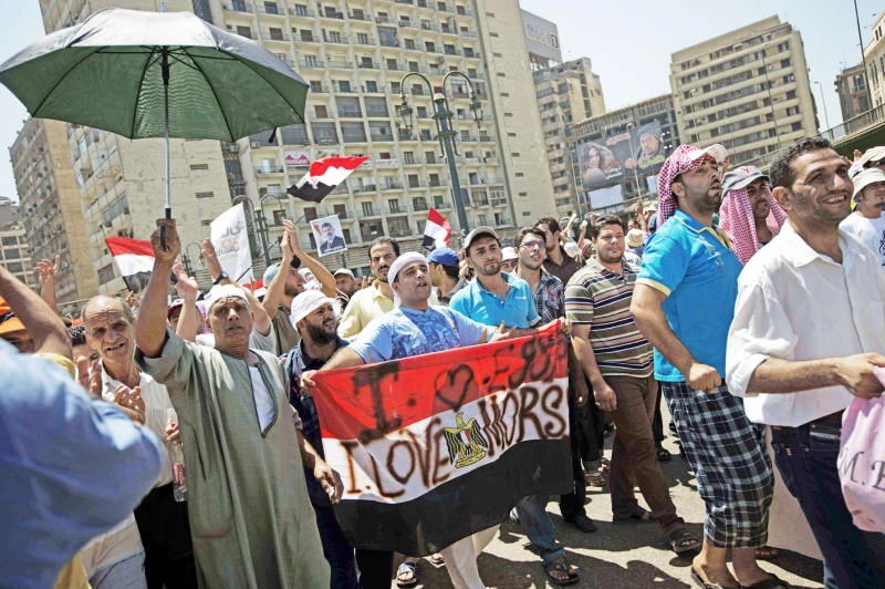 Thousands rally for Mursi; clashes erupt