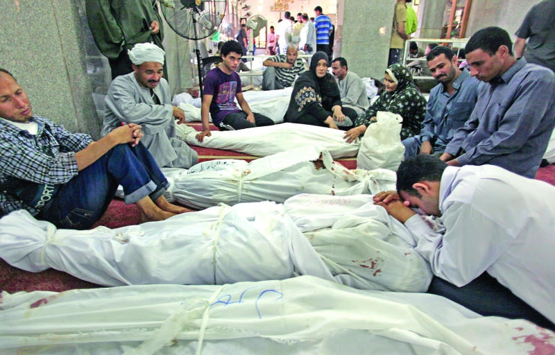 Charred bodies lying in Cairo mosque, unrecognized by govt
