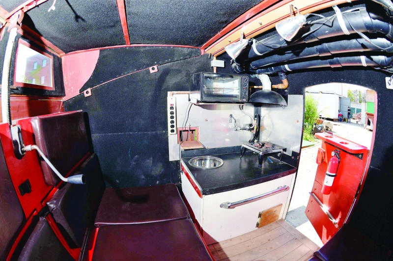 US artist turns dumpster into a home