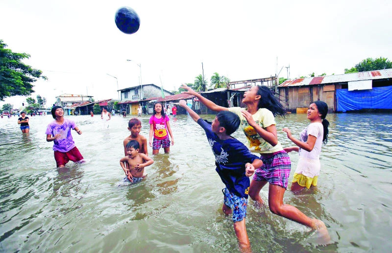 Disaster-weary Philippines mops up after deadly floods