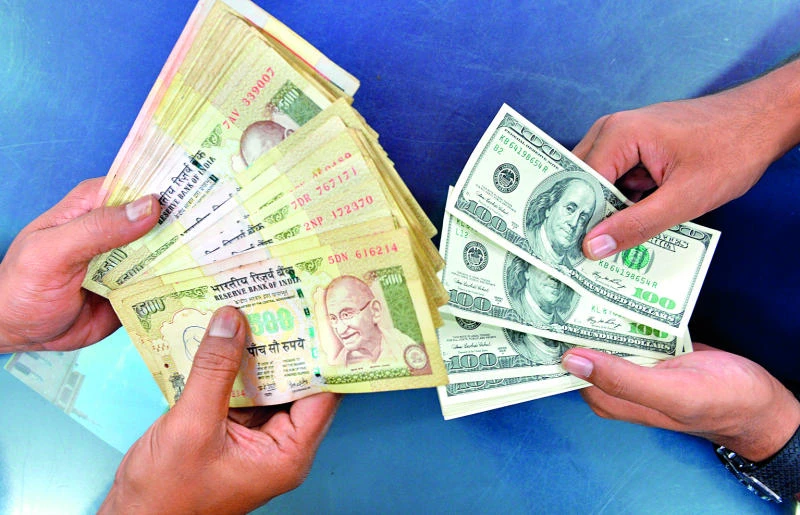 Rupee remains volatile as NRIs debate pros and cons