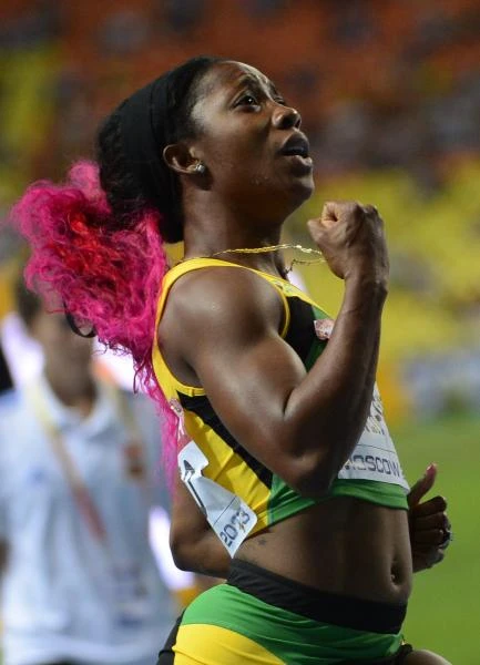 Fraser-Pryce claims gold in 100; Oliver in hurdles