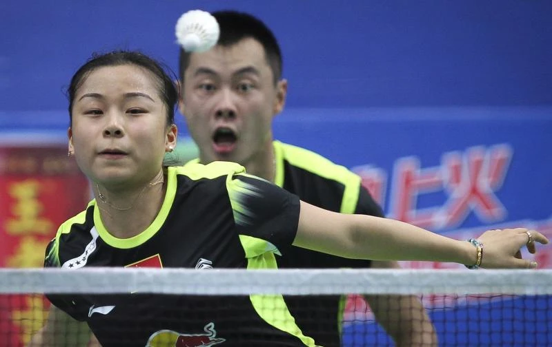 China's top seeds survive scare at worlds