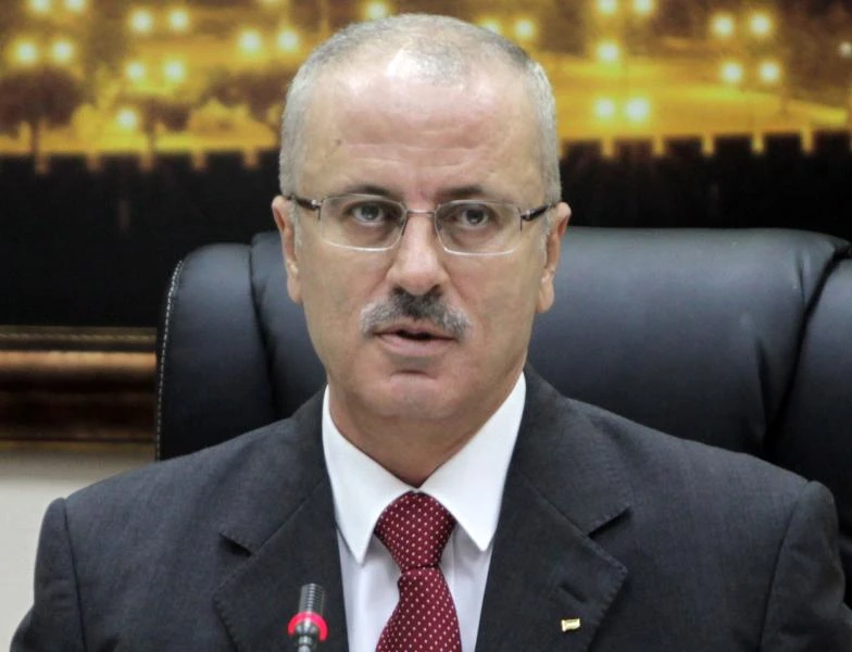 Palestine PM who quit is asked again to form govt