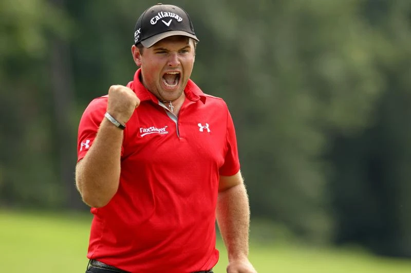 Reed hits magical second shot in playoff to win Wyndham