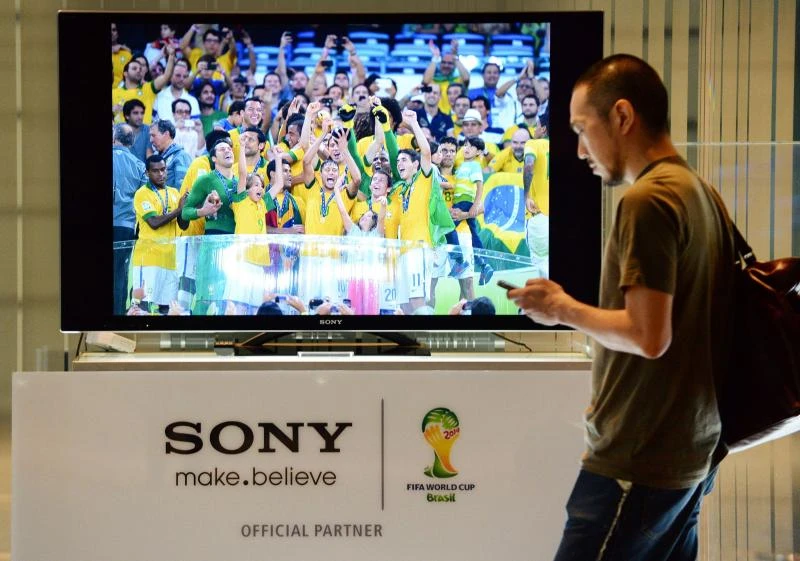 Japan’s Sony, Sharp see brighter future as yen slides