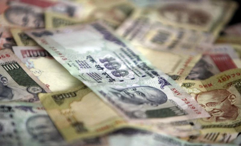 India announces curbs to slow rupee’s decline