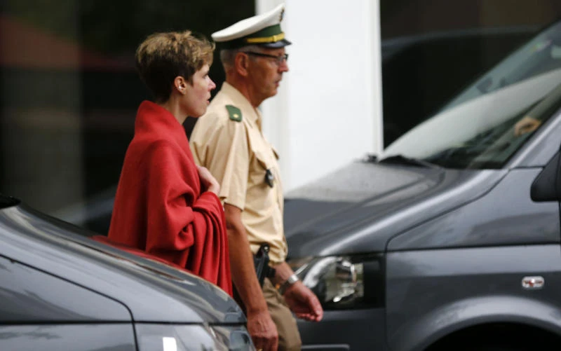 German police arrest hostage-taker, free captives