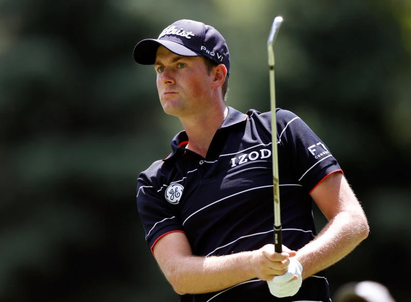 Simpson leads with 64 at Firestone