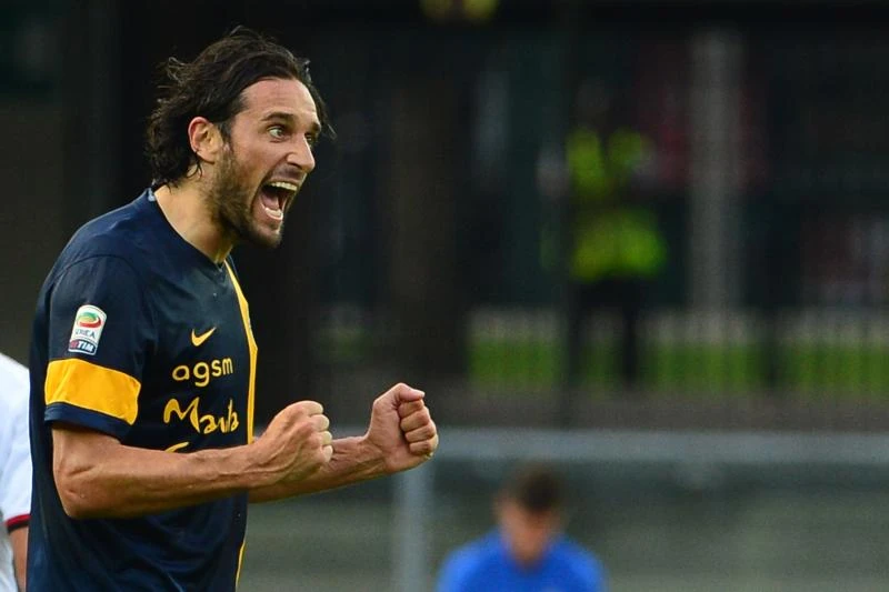 Toni's debut double for promoted Verona stuns Milan