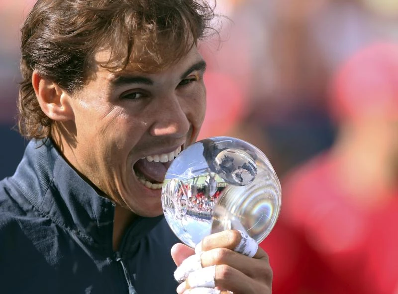 Nadal blitzes past Raonic, lifts third Canadian title