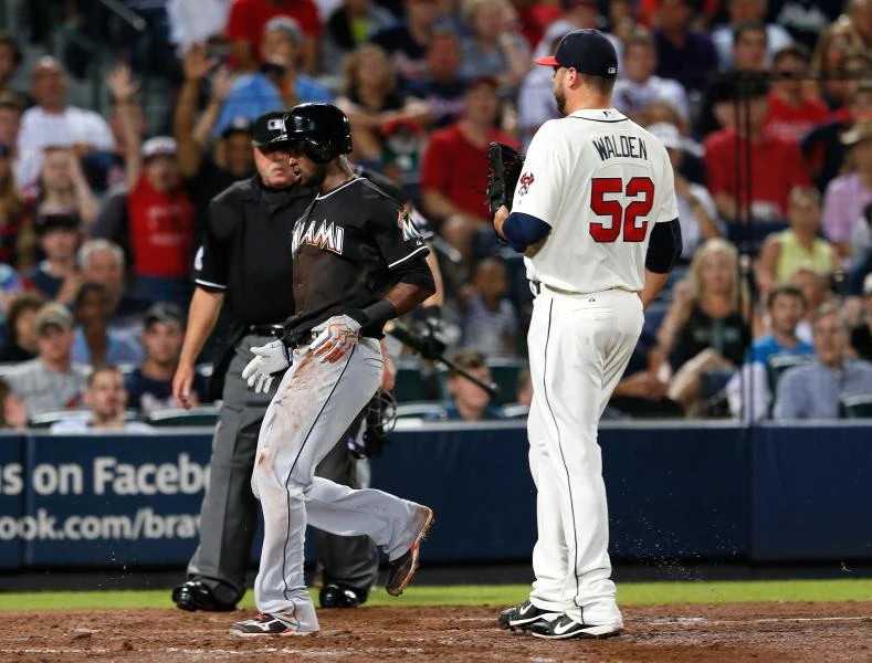 Two streaks end as last-place Marlins edge Braves 1-0
