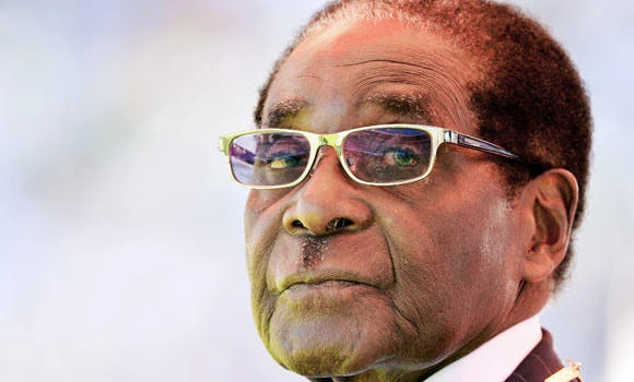 Mugabe threatens UK, US firms