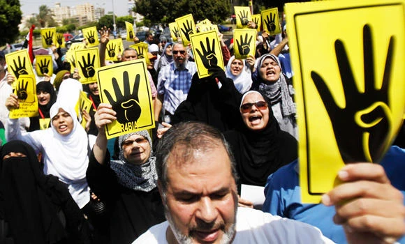 Thousands of Mursi supporters march amid heavy security