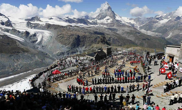 Swiss horn blowers blast away world record on mountain
