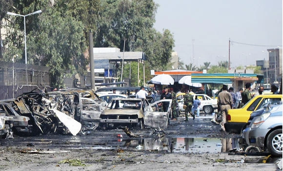 Car bombs hit Baghdad, killing 33 people