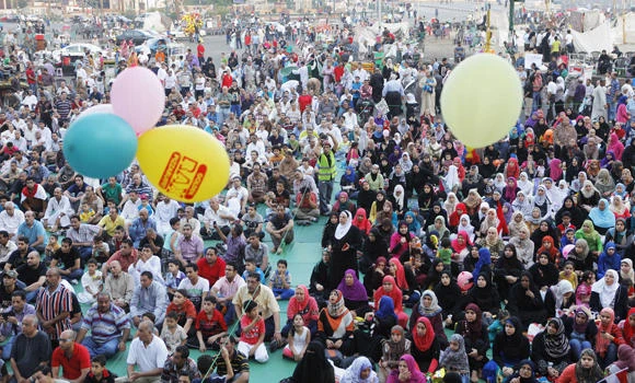 Muslims celebrate Ramadan end, strife casts shadow