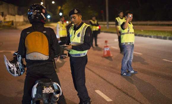 Crime wave puts laid-back Malaysia on edge