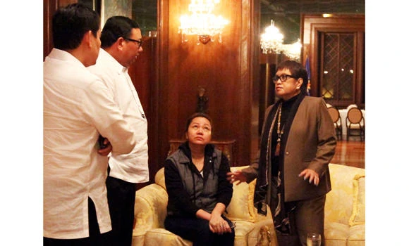Woman at center of Philippine graft scandal surrenders