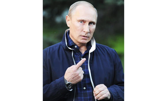 Putin urges US to hold off on striking Syria