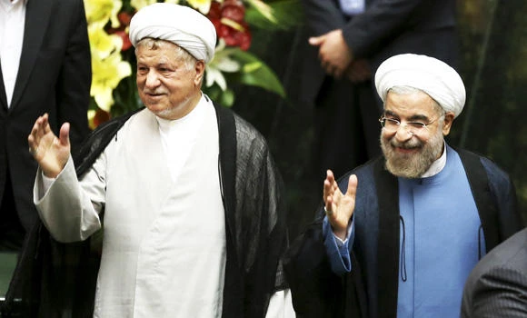 Iran’s Rouhani sworn in, calls West to talk