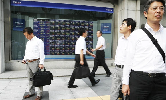 Asian shares rally after string of upbeat data