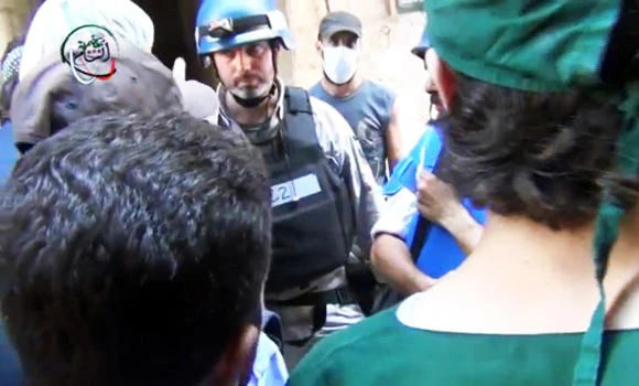 Under sniper fire, UN inspectors speak to chemical attack survivors