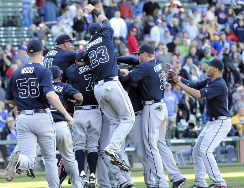 Braves, A’s clinch division titles
