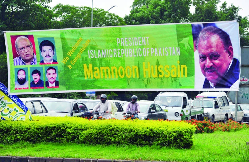 Mamnoon Hussain takes helm