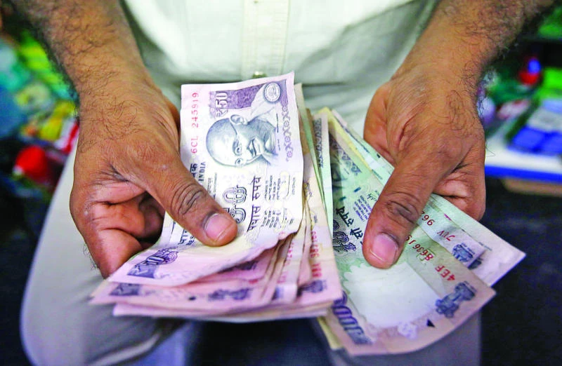 India's rupee at three-week high against dollar