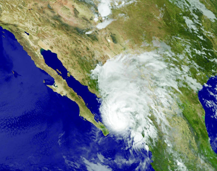 Mudslide buries village as hurricane lashes Mexico