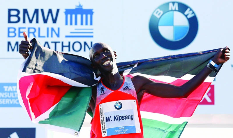 Kipsang sinks marathon world record in Berlin