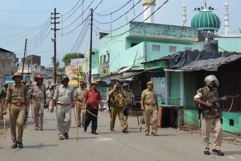 Indian lawmakers face arrest over deadly communal riots