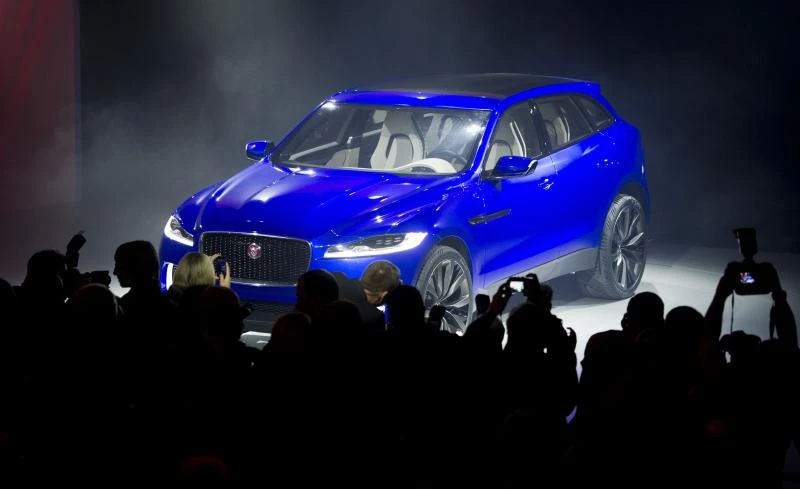 Jaguar breaks with tradition, eyes mass market SUVs, sedans
