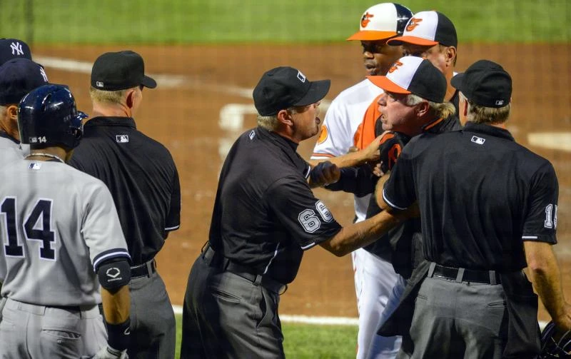 Tillman, Orioles top Yanks in contentious game