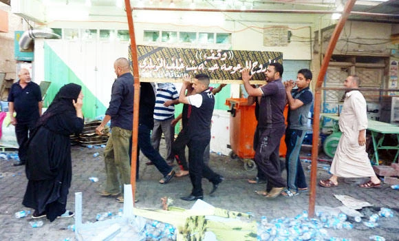Suicide bomber kills 12 in Iraq