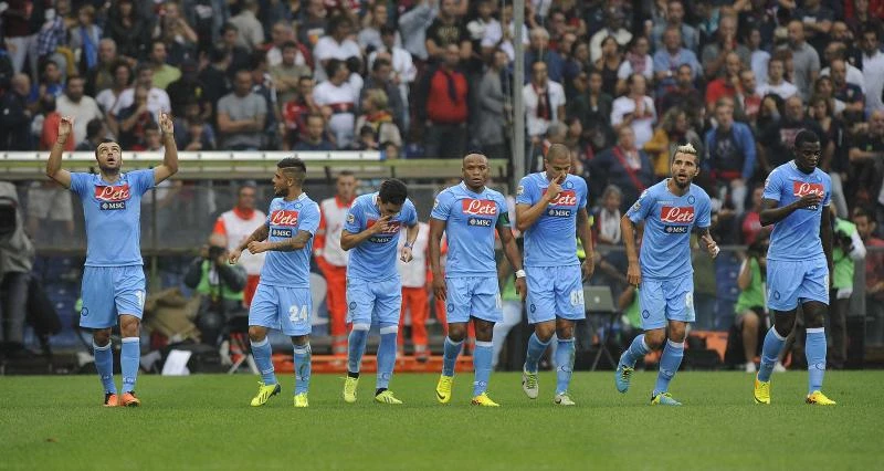 Pandev double puts Napoli top, Milan scrape win