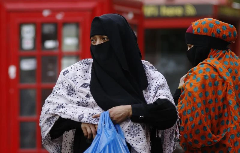 Britain faces up to Muslim veil ban debate